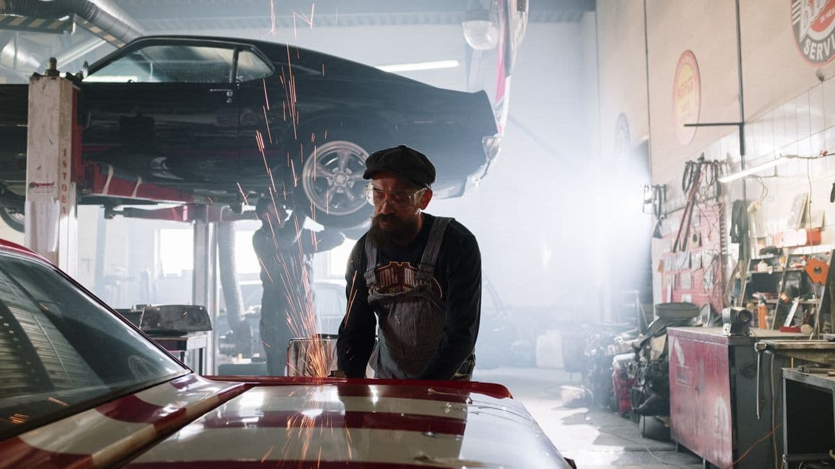 Off-road rim specialist repairing an alloy wheel in a Cape Town workshop at Speedline Mags